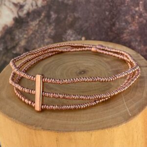 pulsera elasticada de 3 hileras de mostacillas de cobre